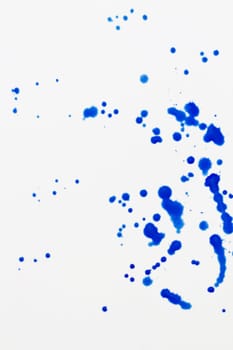 Blue splatter on white background