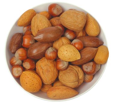 Bowl with assortment of nuts, isolated on white