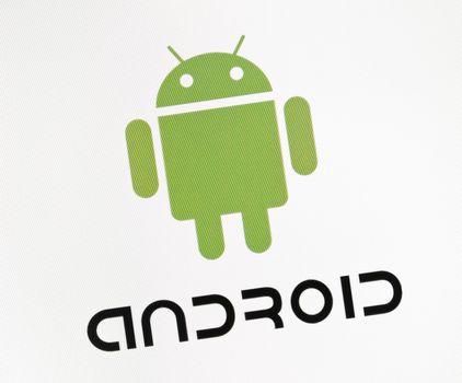 Kiev, Ukraine - December 15, 2011 - Close-up view of Google Android sign on a monitor screen. Android is a operation system for mobile devices like smartphones or tablet pc. Development by Open Handset Alliance and Google inc.