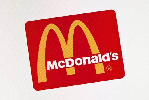 Kiev, Ukraine - December 15, 2011: Close-up view of McDonlads logotype on a monitor screen. McDonalds Corporation is world's largest fast-food company, founded in May 15, 1940 in San Bernardino, California.