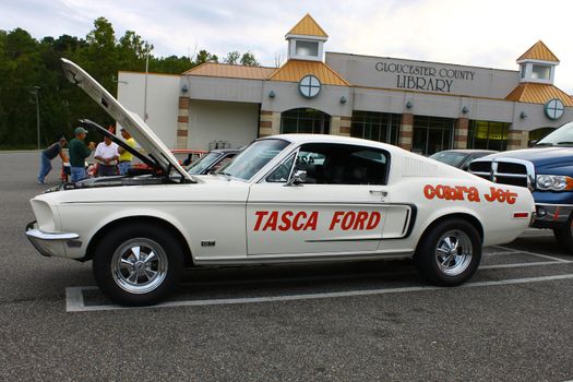 GLOUCESTER, VA, USA -SEPTEMBER 16: Vintage 1957 Ford Mustang in the Middle Peninsula Classic Cruisers Club weekly Car Show. Main Street Center. September 16, 2011 in Gloucester, VA, USA