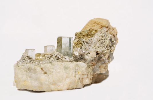 Three clear terminated aquamarine crystals on albite and muscovite specimen from Pakistan