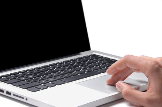 Close-up of male hand typing on laptop keyboard