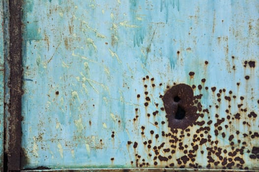 Rusty scratched worn metal surface. Background texture.