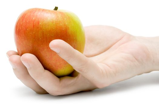 Female hand holding an apple. Isolated on a white background.