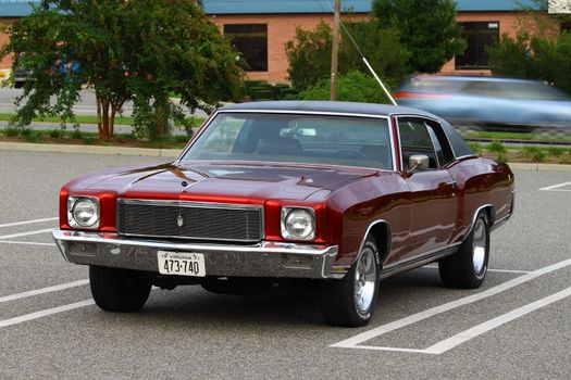 GLOUCESTER, VA, USA -SEPTEMBER 16: Vintage 1971 Chevrolet Monte Carlo in the Middle Peninsula Classic Cruisers Club weekly Car Show. Main Street Center. September 16, 2011 in Gloucester, VA, USA