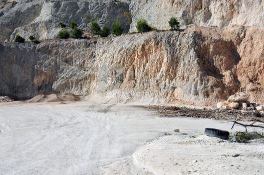 Deserted landscape of a mountain quarry site.