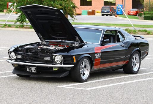 GLOUCESTER, VA, USA -SEPTEMBER 16: Vintage 1970 Ford Boss 427 Mustang in the Middle Peninsula Classic Cruisers Club weekly Car Show. Main Street Center. September 16, 2011 in Gloucester, VA, USA