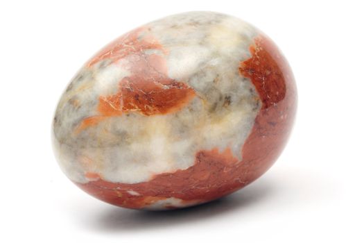 Stone Easter egg isolated on white.