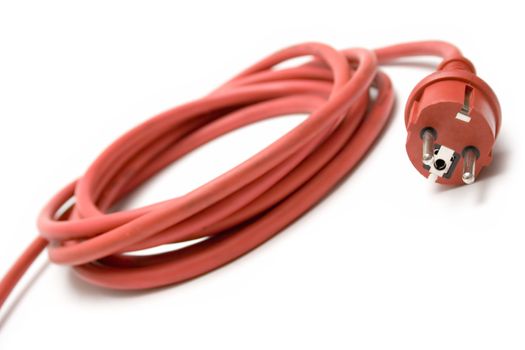 Red extension cable istolated on white.