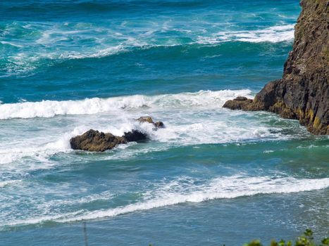 Boulder on the Shore with Waves Crashing