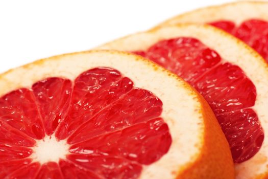 Macro view of fresh slices of grapefruit