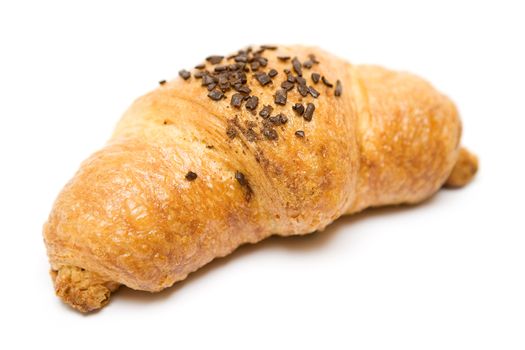 Baked croissant with chocolate isolated on a white background.