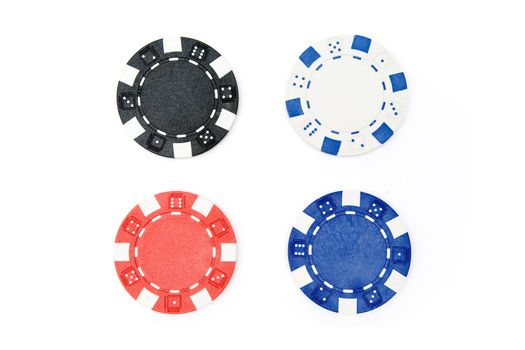 Different poker chips isolated on a white background.
