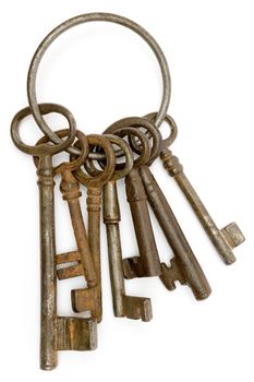 Antique bunch of keys isolated on a white background.