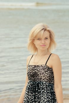 Beautiful  woman posing at the beach