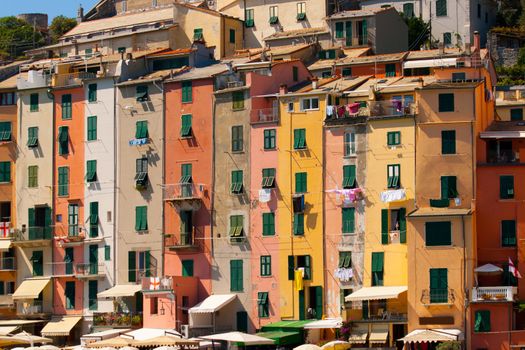 Colorful rowhouses and hanging laundry in the fishing village of Portovenere, on Italy's west coast.