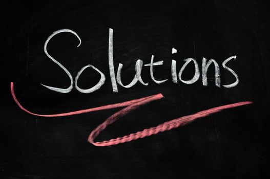 Solutions written with chalk on blackboard