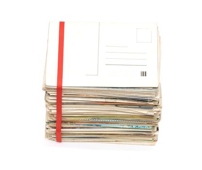 Big pile of old letters and postcards with blank postcard for your text