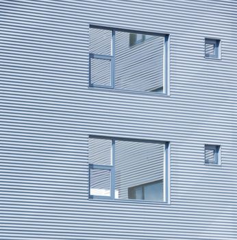 Window on the side of an modern house.