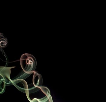 colorful green and red smoke patterns on a black background