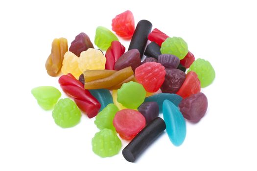 Colorful fruits candy closeup on white background