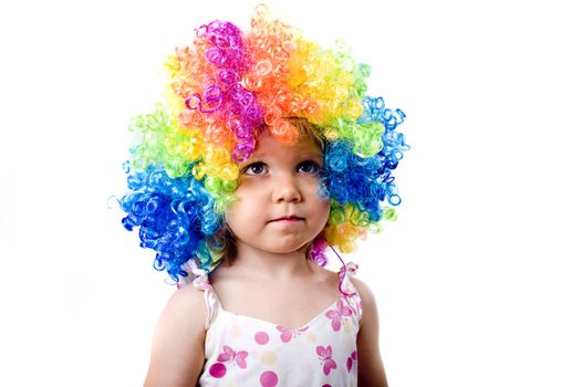 Little gir is heaving colourfull hair, child portrait