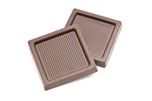 Delicious chocolates closeup on white background 
