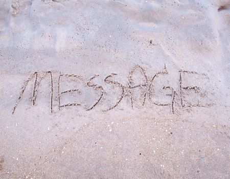 Message drawn on the sand in tropical beach