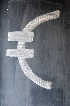Euro sign written on a blackboard