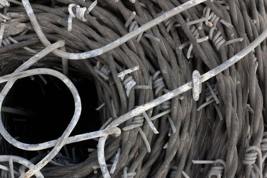 close up of a roll of barb wire background