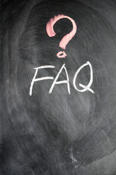FAQ written with chalk on blackboard