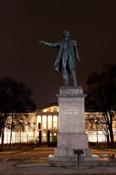 Statue of A. Pushkin, famous Russian poet. Arts Square, St.Petersburg, Russia by night