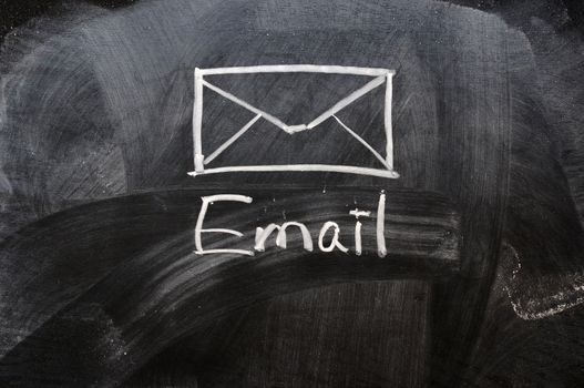 Handwriting of Email with an Envelope on a blackboard