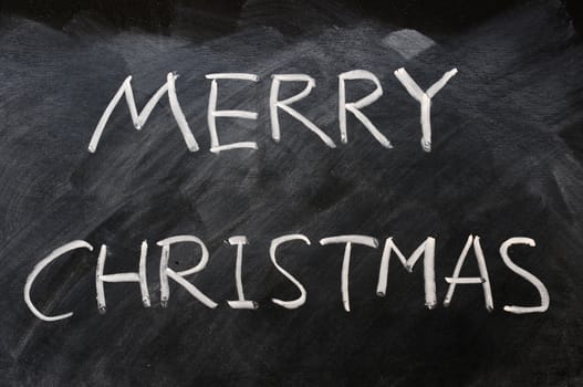 Handwriting of Merry Christmas on a blackboard