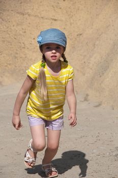 Shot of runing girl in yellow t-shirt