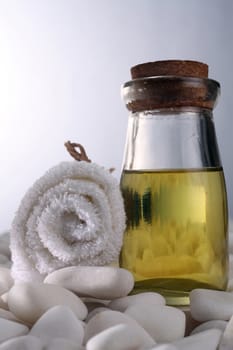 roll up of the towel and massage oil