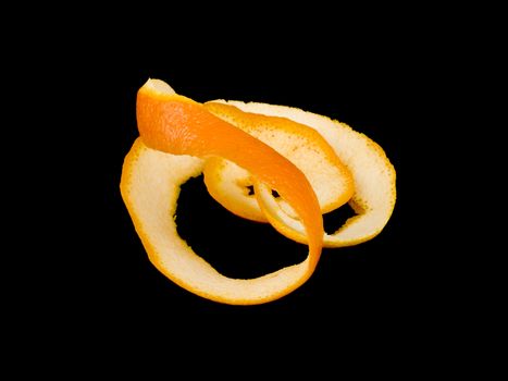 Orange peel on black background