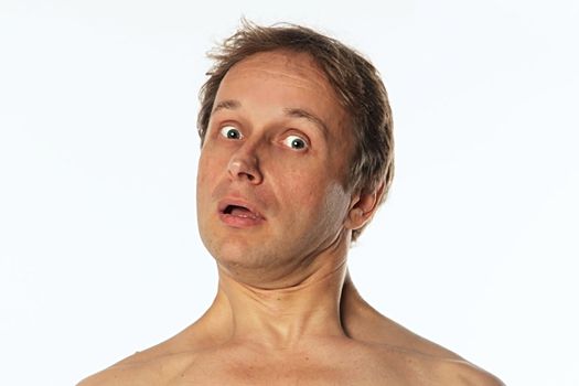 Portrait of a suprise middle age man with naked shoulder