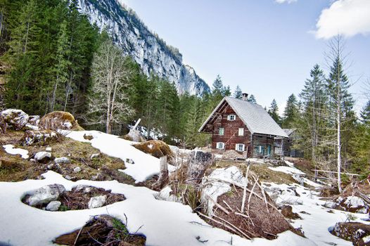 Small hut in winter landscape in the austrian alps