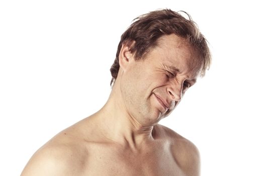 Portrait of a middle age man with naked shoulder who is harried by constant doubts