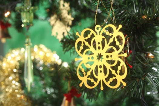 christmas ornament on the christmas tree with chashing light