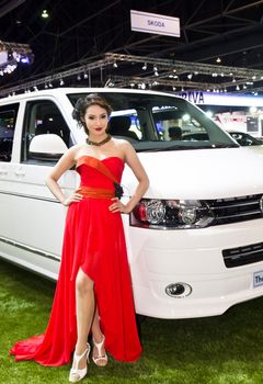 NONTABURI,THAILAND - DECEMBER 3,2011: Unidentified female presenter at booth  Thailand International Motor Expo 2011 on December 3, 2011 in Nonthaburi, Thailand.