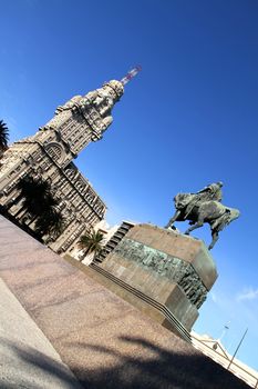 The Plaza independencia in Montevideo, Uruguay. The Palacio Salvo in the Background and the Monument of the grave of General Artigas in the Foreground.