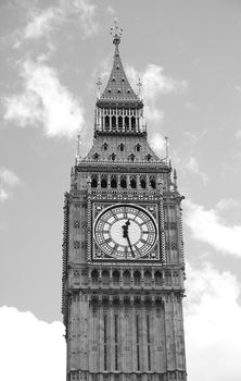 Big Ben with fluffy white clouds, b/w