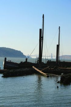 Big old ship parked at a marina.
