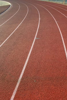 Close up of a running track on sunny day.
