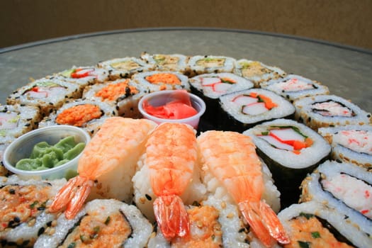 Close up of sushi assortment on a platter.
