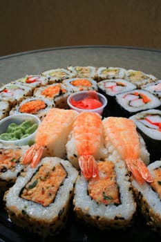 Close up of sushi assortment on a platter.
