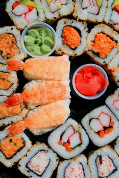 Close up of sushi assortment on a platter.
